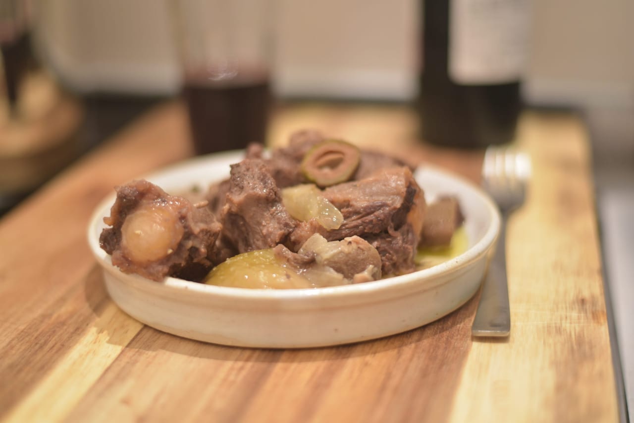 oxtail and green almonds stew