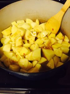 adding-the-potatoes