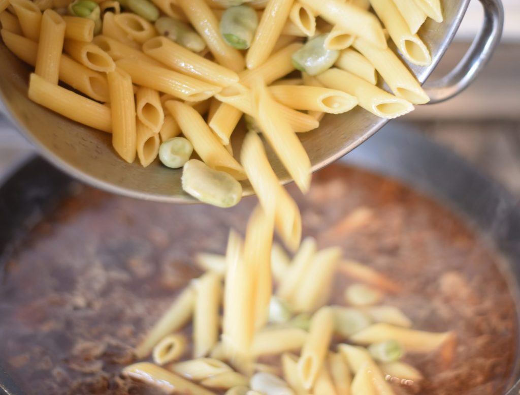 Pasta with oxtail and fava beans