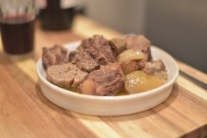 oxtail and green almonds stew